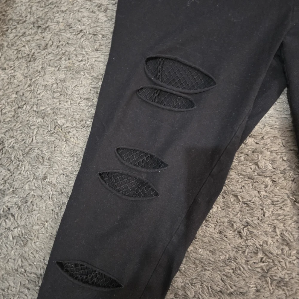 Torrid Black Ripped Leggings with Mesh Detail - Picture 3 of 7